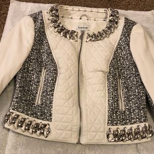 Small bebe white chain jacket.